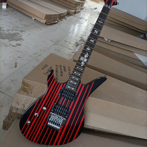 6 strings left handed black unusual shaped electric guitar with red stripe rosewood fretboard
6 strings left handed black unusual shaped electric guitar with red stripe rosewood fretboard