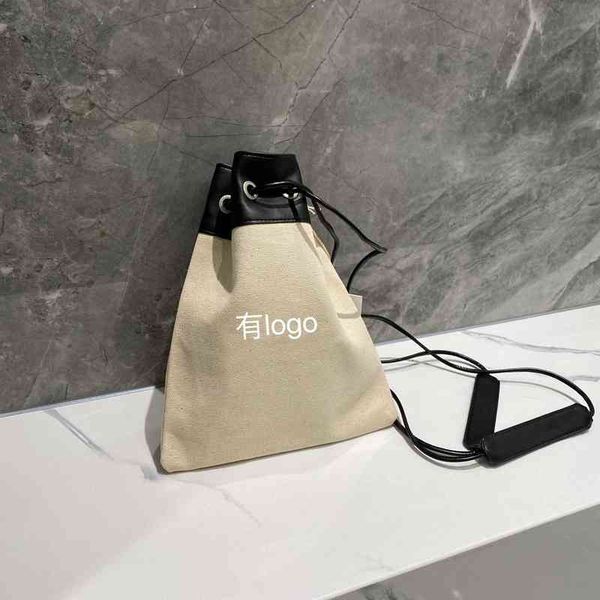 jil canvas bag single shoulder menger drawstring binding commuting bucket student portable
jil canvas bag single shoulder menger drawstring binding commuting bucket student portable