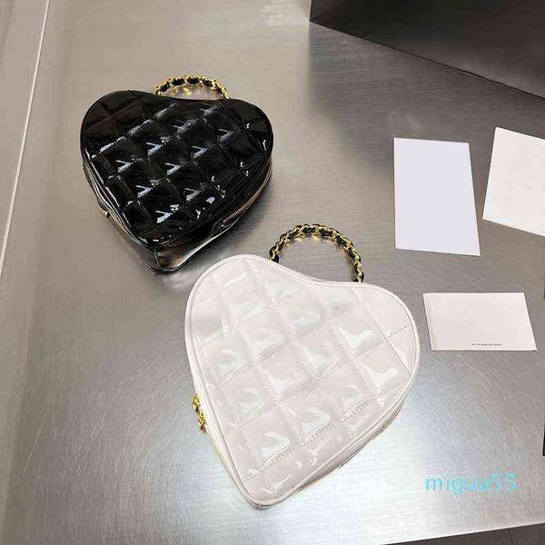 5a spring heart style valentine day bags classic handle quilted leather famous luxury designer clutch mini cosmetic case
5a spring heart style valentine day bags classic handle quilted leather famous luxury designer clutch mini cosmetic case