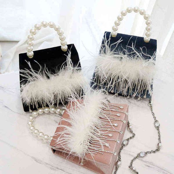 women's diamond-encrusted rhinestone tassel feather evening clutch bag female fashion pearl chain handbag shoulder messenger 220516
women's diamond-encrusted rhinestone tassel feather evening clutch bag female fashion pearl chain handbag shoulder messenger 220516