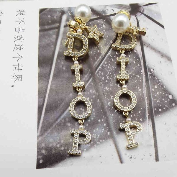 2022 factory wholesale new di home light luxury version letters full of diamond tassels pearl high sense earrings female, Golden
2022 factory wholesale new di home light luxury version letters full of diamond tassels pearl high sense earrings female, Golden
