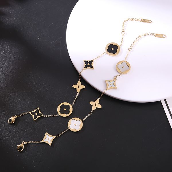 fashion black white shell clover charm bracelet 18k gold stainless steel jewelry for women gift, Golden;silver
fashion black white shell clover charm bracelet 18k gold stainless steel jewelry for women gift, Golden;silver