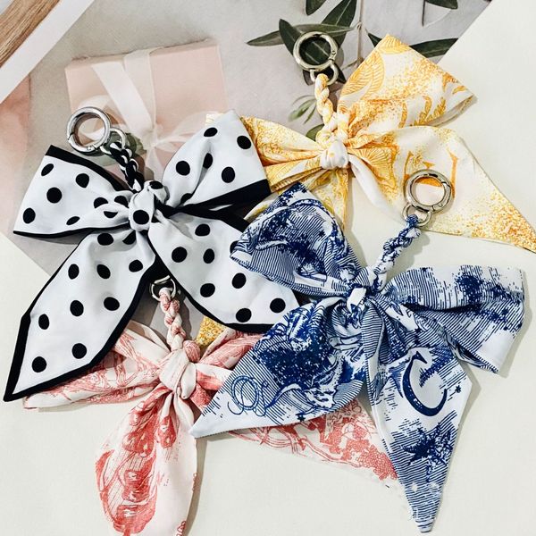 new alphabet silk scarf key chain bow keychain creative party fvaor fashion car keyring creative ladies bag pendant
new alphabet silk scarf key chain bow keychain creative party fvaor fashion car keyring creative ladies bag pendant