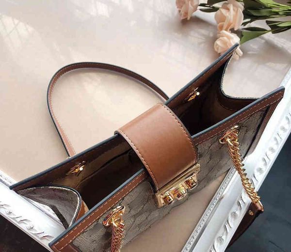 g family padlock color contrast lock printed portable shopping chain tote bag single shoulder women's bag
g family padlock color contrast lock printed portable shopping chain tote bag single shoulder women's bag