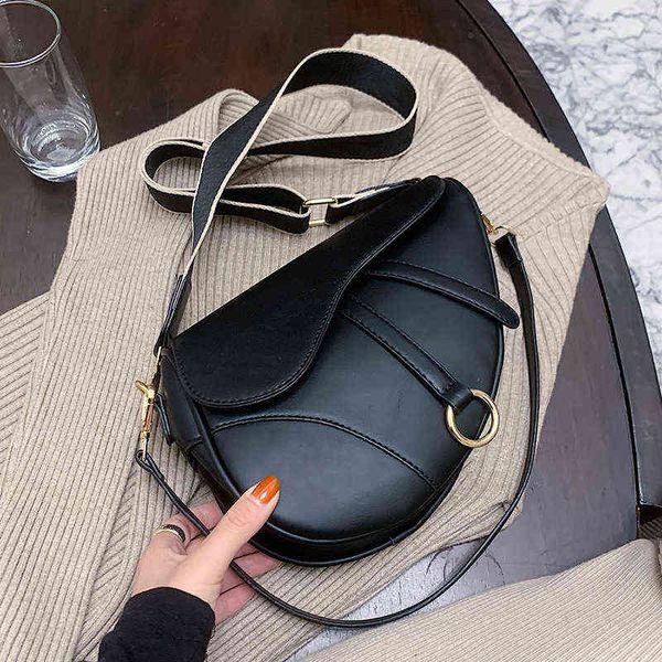 factory online export designer tide brand ladies bag saddle spring new fashion wide shoulder strap msenger urban simple single street
factory online export designer tide brand ladies bag saddle spring new fashion wide shoulder strap msenger urban simple single street