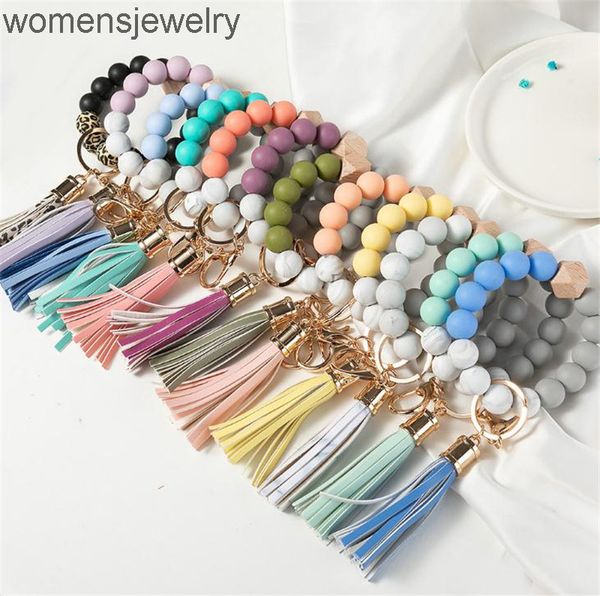 14 colors wooden tassel bead string bracelet keychain food grade silicone beads bracelets women girl key ring wrist strap db961, Silver
14 colors wooden tassel bead string bracelet keychain food grade silicone beads bracelets women girl key ring wrist strap db961, Silver
