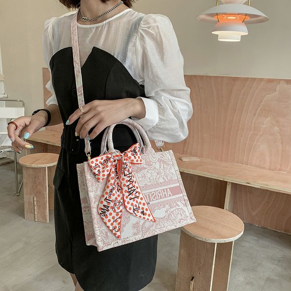 new designer bags printed handbag women's 2022 fashion canvas large capacity shoulder bow scarf tote
new designer bags printed handbag women's 2022 fashion canvas large capacity shoulder bow scarf tote