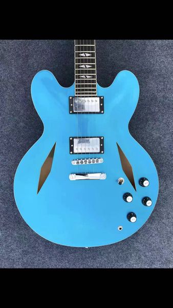 jazz electric guitar light blue semi hollow body double diamond hole
jazz electric guitar light blue semi hollow body double diamond hole