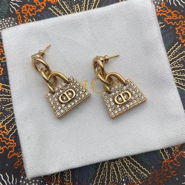 fashion jewelry online niche design full diamond bag earrings female net red live broadcast of the same earrings, Golden
fashion jewelry online niche design full diamond bag earrings female net red live broadcast of the same earrings, Golden