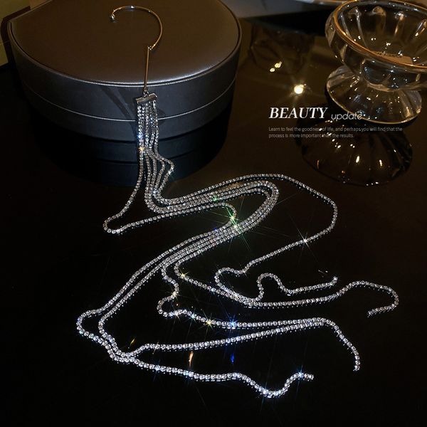 european and american diamond-studded tassel earrings exaggerated personalized left ear single fashion ear hanging metal cold style graceful, Golden
european and american diamond-studded tassel earrings exaggerated personalized left ear single fashion ear hanging metal cold style graceful, Golden