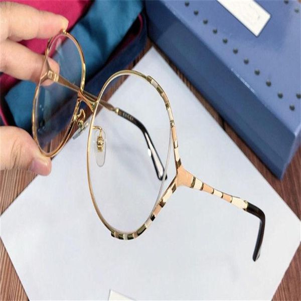 new fashion designer optical glasses 0596 large frame hollow metal frame popular style hd clear lens280n, Black
new fashion designer optical glasses 0596 large frame hollow metal frame popular style hd clear lens280n, Black