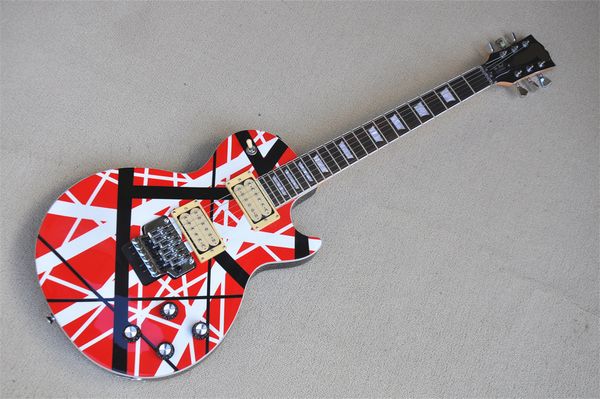 red electric guitar black & white stripes tremolo bridge mahogany body rosewood fingerboard 22 frets white bound chrome knobs
red electric guitar black & white stripes tremolo bridge mahogany body rosewood fingerboard 22 frets white bound chrome knobs