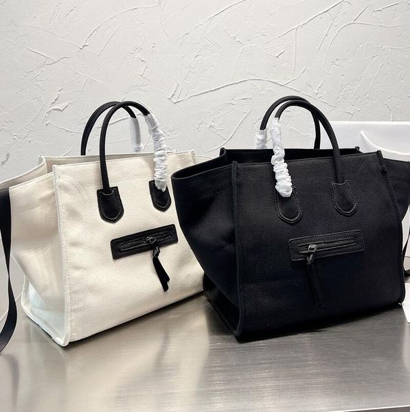 classic designer brand canvas shopping bag high capacity women handbag fashion luxury solid color simple women's totes single-shoulder
classic designer brand canvas shopping bag high capacity women handbag fashion luxury solid color simple women's totes single-shoulder