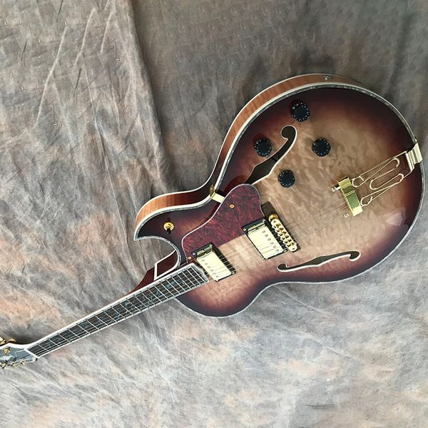 chinese electric guitar es mahogany 335 body les flame maple 6 strings honey sunburst color
chinese electric guitar es mahogany 335 body les flame maple 6 strings honey sunburst color