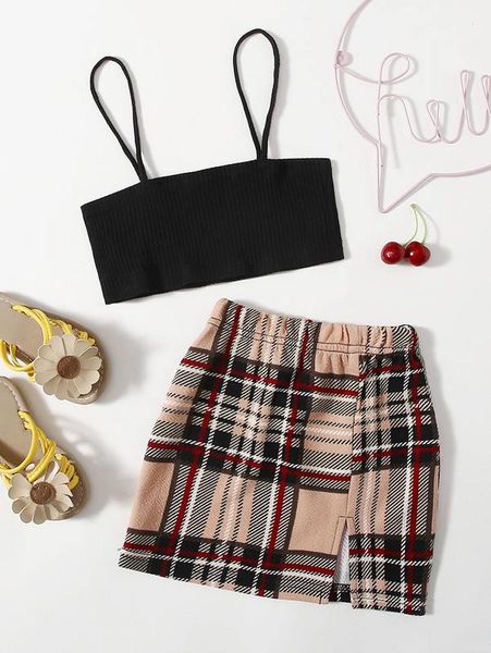 little girl's short suspender and checked skirt she, White
little girl's short suspender and checked skirt she, White