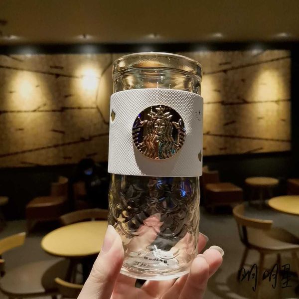 starbucks 2021 white gold cup 420ml embossed goddess fish scale glass with insulated cup cover deskcup
starbucks 2021 white gold cup 420ml embossed goddess fish scale glass with insulated cup cover deskcup