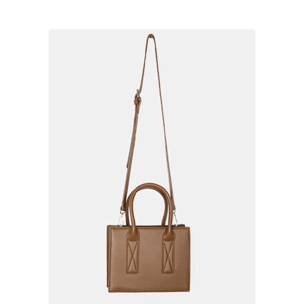 bag women's bag korean trendy new high-capacity high-grade texture stereotyped portable tote niche design messenger wholesale
bag women's bag korean trendy new high-capacity high-grade texture stereotyped portable tote niche design messenger wholesale