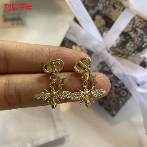 80% off clearance high version letter star full of diamond female light luxury fashion earrings, Golden
80% off clearance high version letter star full of diamond female light luxury fashion earrings, Golden