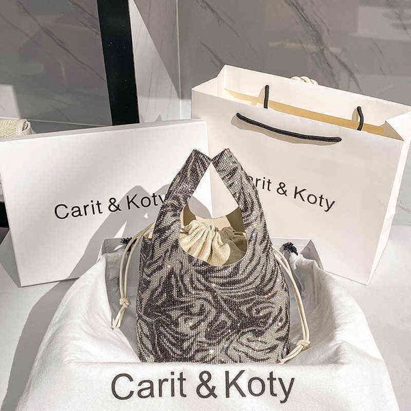 luxury designer trendy original zebra pattern bucket bag diamond rhinestone handbag women bling evening clutch purse 220516
luxury designer trendy original zebra pattern bucket bag diamond rhinestone handbag women bling evening clutch purse 220516