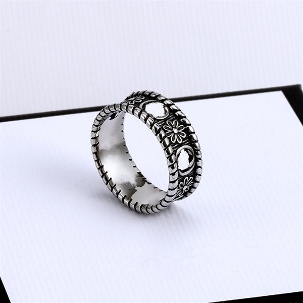 titanium steel hollow chrysanthemum double g band black silver rings for men and women luxury classic couple wedding gift jewelry271i
titanium steel hollow chrysanthemum double g band black silver rings for men and women luxury classic couple wedding gift jewelry271i