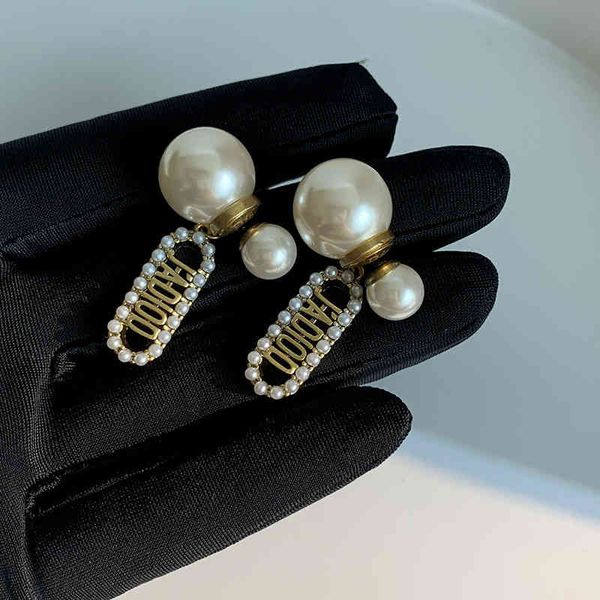 style d front and back pearl female 925 sier needle earrings 2022 luxury brand fashion design versatile ladies jewelry, Golden
style d front and back pearl female 925 sier needle earrings 2022 luxury brand fashion design versatile ladies jewelry, Golden