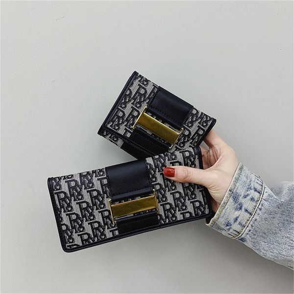 small wallet women's short new ultra thin folding small change clip retro multi card long hand 699 design purses online, Red;black
small wallet women's short new ultra thin folding small change clip retro multi card long hand 699 design purses online, Red;black