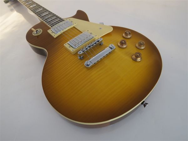 smoked sunburst flame maple electric guitar tuilp tuners, chrome hardware, mahogany body
smoked sunburst flame maple electric guitar tuilp tuners, chrome hardware, mahogany body