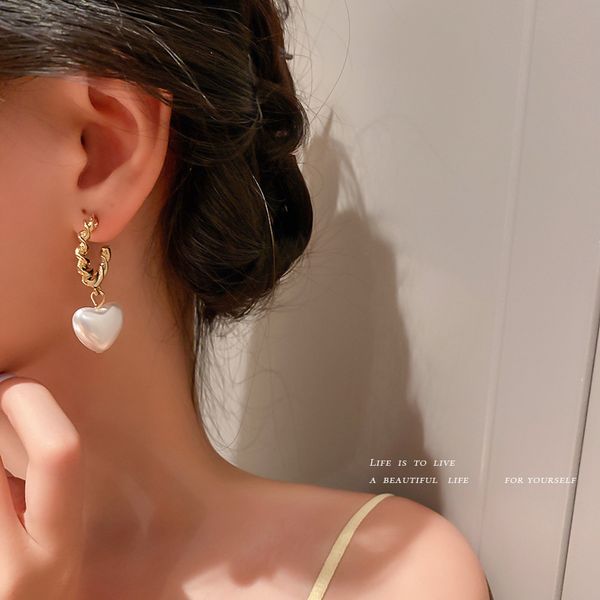 925 silver needle pearl love heart korean retro simple ladies fashion stud earrings lady peach heart personalized eardrop, Golden
925 silver needle pearl love heart korean retro simple ladies fashion stud earrings lady peach heart personalized eardrop, Golden