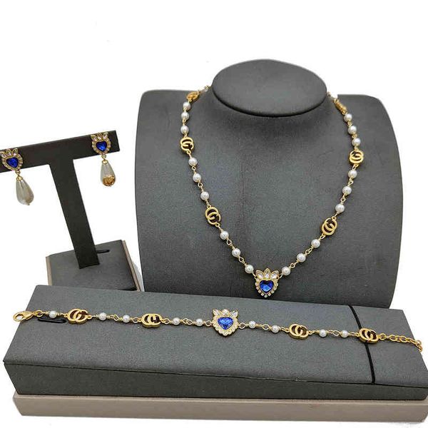 925 silver needle earrings women's fashion new high-end suit pearl blue zircon necklace bracelet earrings, Black
925 silver needle earrings women's fashion new high-end suit pearl blue zircon necklace bracelet earrings, Black