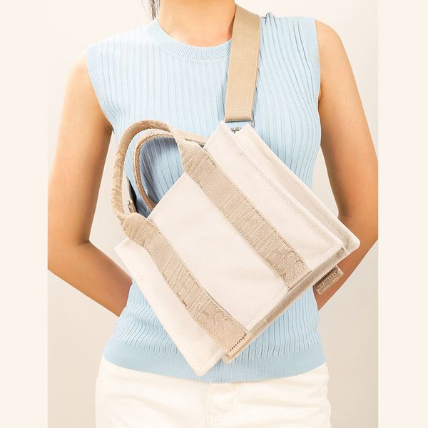 brands canvas tote women handbags casual letter crossbody bags for women designer canvas shoulder bag small women's bag 220715
brands canvas tote women handbags casual letter crossbody bags for women designer canvas shoulder bag small women's bag 220715