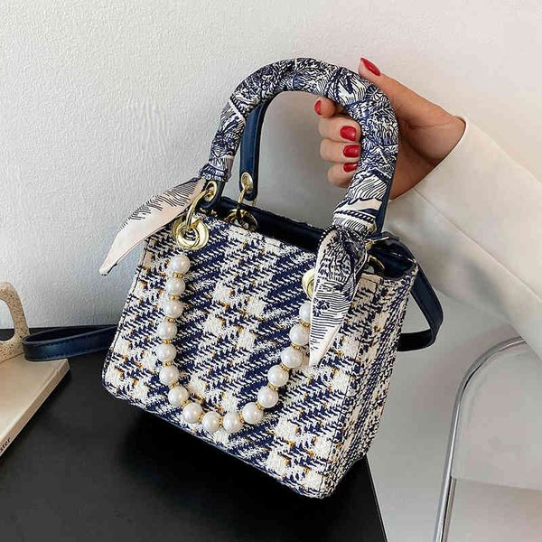 summer foreign style small women's 2022 new fashion pearl portable princess of wales bag textured fabric woven diagonal luxury designer
summer foreign style small women's 2022 new fashion pearl portable princess of wales bag textured fabric woven diagonal luxury designer