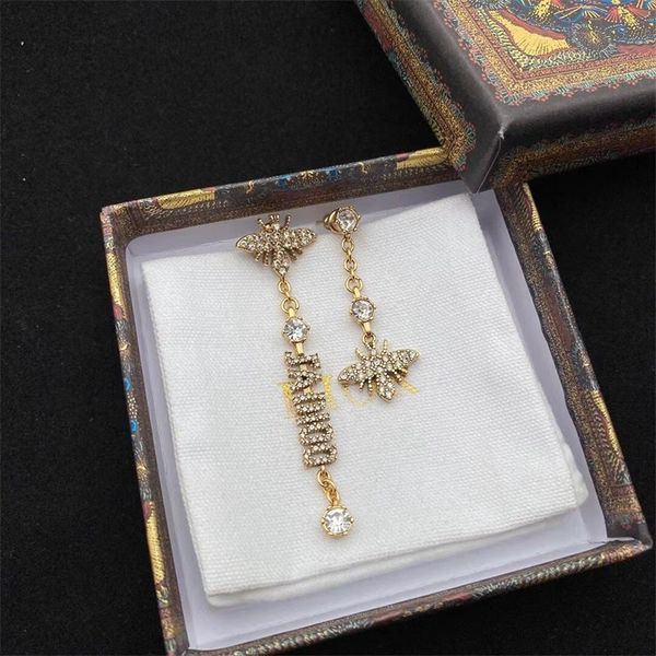 shop jewelry discounts 21 new letter asymmetric inlaid diamond earrings women's high version earrings, Golden
shop jewelry discounts 21 new letter asymmetric inlaid diamond earrings women's high version earrings, Golden