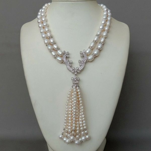 19" 2 strands cultured white rice freshwater pearl necklace zircon pave pearl tassel pendant, Silver
19" 2 strands cultured white rice freshwater pearl necklace zircon pave pearl tassel pendant, Silver