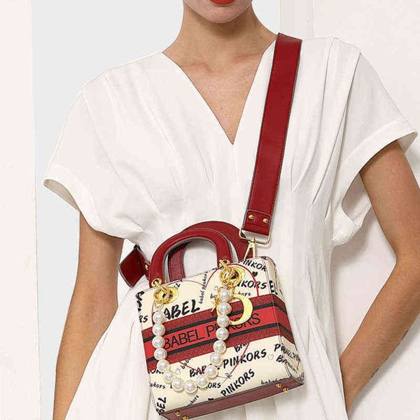 summer fashion famous lovely girls messenger graffiti bag hard handle shopping basket shoulder handbag for women & ladies 220427
summer fashion famous lovely girls messenger graffiti bag hard handle shopping basket shoulder handbag for women & ladies 220427