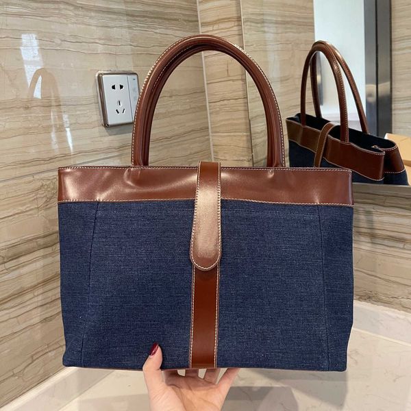 2021 dark blue denim + leather stitching women bag retro simple handbag large capacity classic tote bag fashion shoulder purse
2021 dark blue denim + leather stitching women bag retro simple handbag large capacity classic tote bag fashion shoulder purse