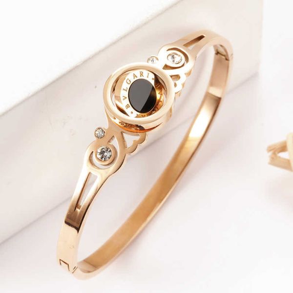net red selling new titanium steel rotating bracelet women's simple open 18k niche design brand jewelry, Black
net red selling new titanium steel rotating bracelet women's simple open 18k niche design brand jewelry, Black