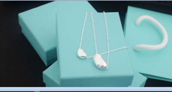 2022 silver thin long chain necklaces bean pendant stainless steel size with blue box and dust bag
2022 silver thin long chain necklaces bean pendant stainless steel size with blue box and dust bag