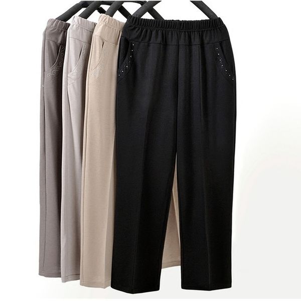 middleaged women straight pants fashion casual elastic waist loose pants large size grandma female summer solid nine pants 5xl y200114, Black;white
middleaged women straight pants fashion casual elastic waist loose pants large size grandma female summer solid nine pants 5xl y200114, Black;white