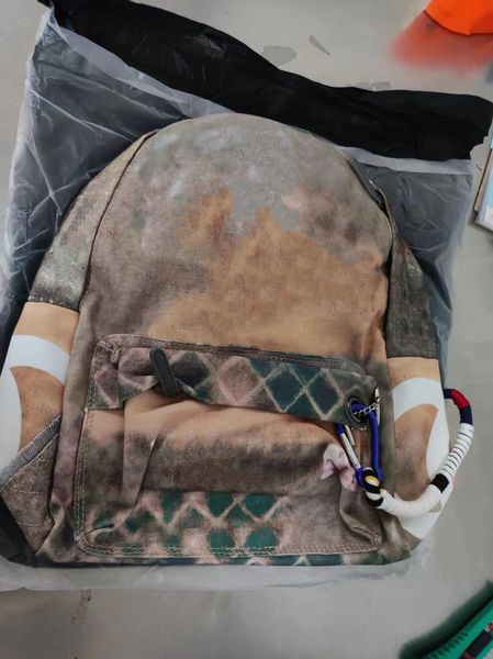 fashion backpack style graffiti printed rope bag embroidered with multicolored print canvas backpack school
fashion backpack style graffiti printed rope bag embroidered with multicolored print canvas backpack school