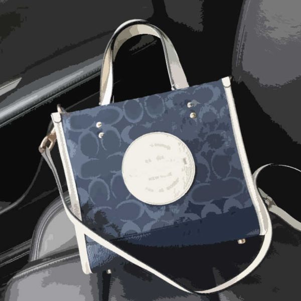 kou family women's bag aolai new dempsey vertical handbag xiang bretot handbag canvas printed shopping bags
kou family women's bag aolai new dempsey vertical handbag xiang bretot handbag canvas printed shopping bags