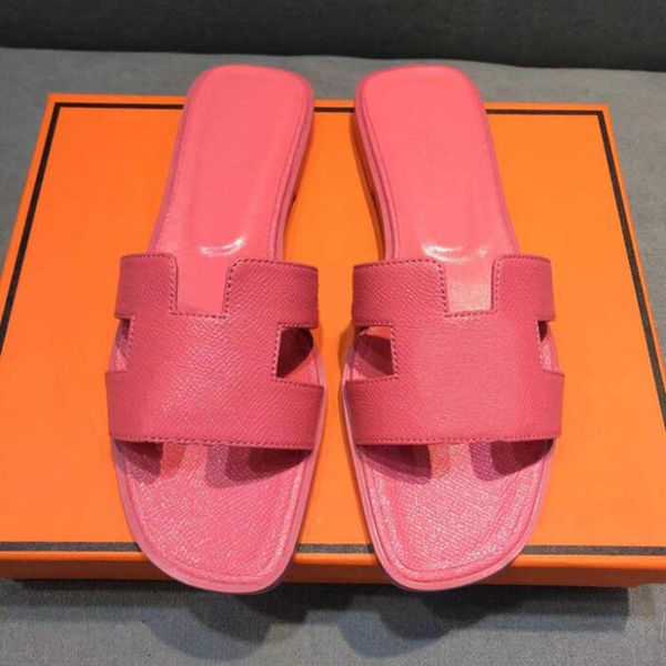 2022 oran sandals womens designer flat slippers flip flop lychee skin 2022 fashion ladies summer beach slides genuine patent black white bro
2022 oran sandals womens designer flat slippers flip flop lychee skin 2022 fashion ladies summer beach slides genuine patent black white bro