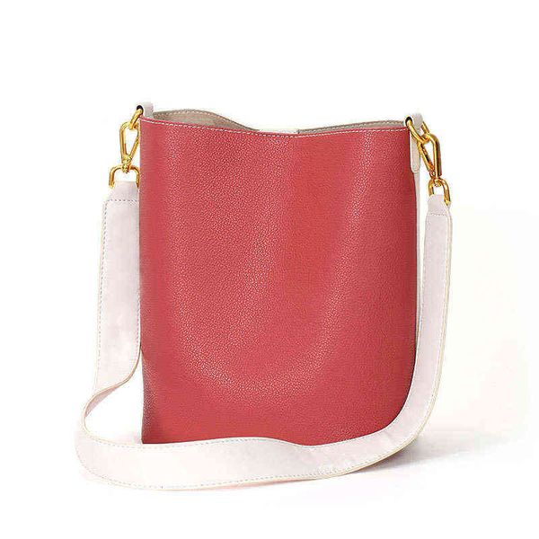 double sided color matching mother bag large capacity diagonal bucket shoulder minority leather women's bag 220615
double sided color matching mother bag large capacity diagonal bucket shoulder minority leather women's bag 220615