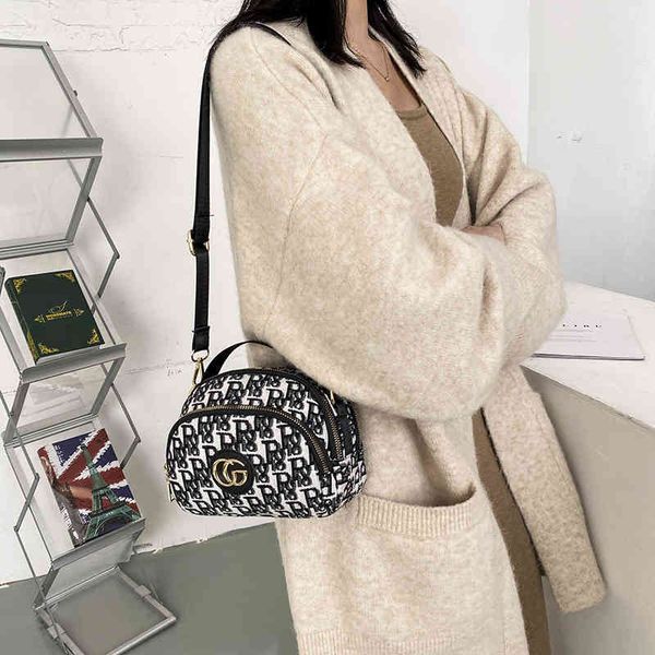 net red small bag women's 2020 new fashion korean version three-layer canvas one shoulder messenger bag versatile leisure luxury design
net red small bag women's 2020 new fashion korean version three-layer canvas one shoulder messenger bag versatile leisure luxury design