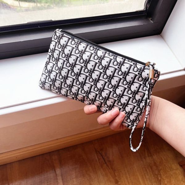 leather fashionable new women's wallet large capacity letter simple hand bag designer fashion casual handbags, Brown;gray
leather fashionable new women's wallet large capacity letter simple hand bag designer fashion casual handbags, Brown;gray