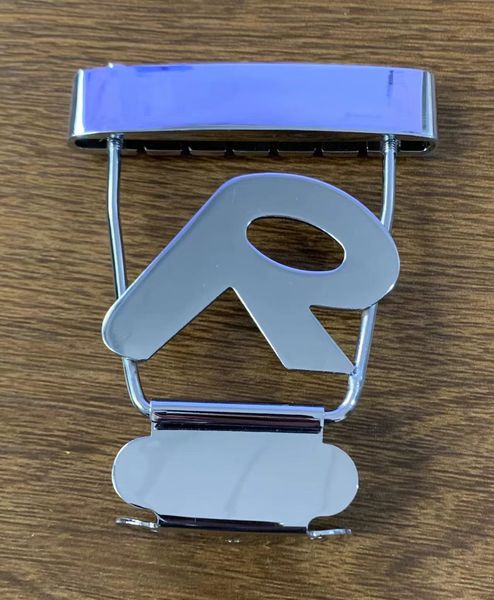 metalic cover of bridge and tailpiece for electric bass guitar accessories chrome color in stock
metalic cover of bridge and tailpiece for electric bass guitar accessories chrome color in stock