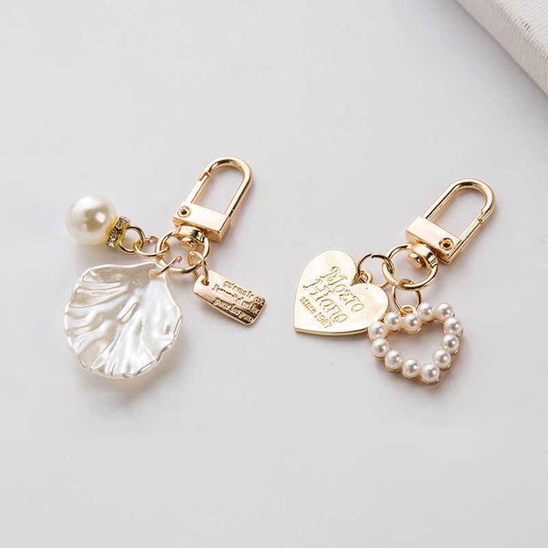 keychains women girls heart shell pendant keychain fashion elegant letter label imitation pearls key chain handbag hanging keyring, Silver
keychains women girls heart shell pendant keychain fashion elegant letter label imitation pearls key chain handbag hanging keyring, Silver