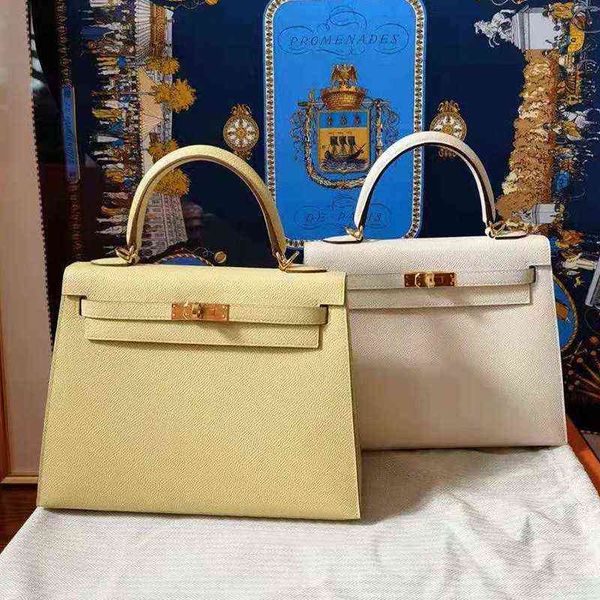 2022 designer herbag high sense luxury tote handbags summer fashion chicken yellow leather women's small one shoulder messenger
2022 designer herbag high sense luxury tote handbags summer fashion chicken yellow leather women's small one shoulder messenger