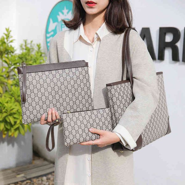 2022 new simple and versatile handbag printed messenger bag trend mother and son bag three piece set women's bag
2022 new simple and versatile handbag printed messenger bag trend mother and son bag three piece set women's bag