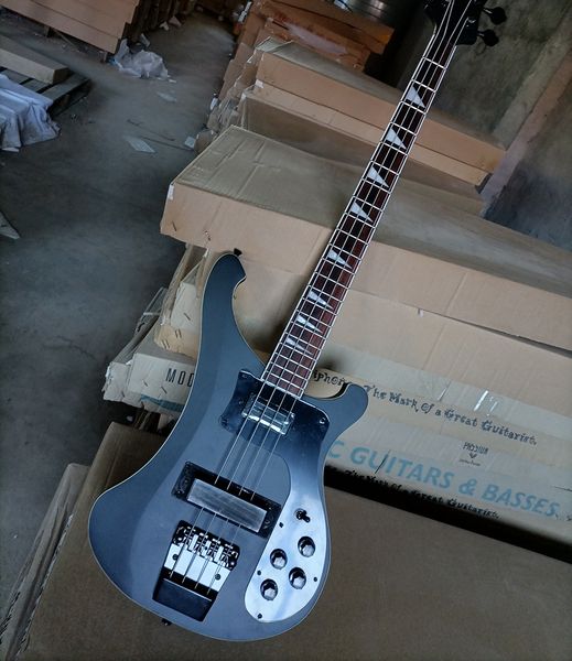 4 strings matte black electric bass guitar with black hardware rosewood fretboard
4 strings matte black electric bass guitar with black hardware rosewood fretboard