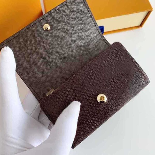 luxurys designers key wallets women clutch holder 6 metal hanging buckle keychain leather keybag mini coin purse fashion man with box 10, Silver
luxurys designers key wallets women clutch holder 6 metal hanging buckle keychain leather keybag mini coin purse fashion man with box 10, Silver